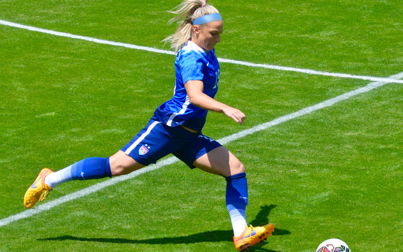 Julie Johnston playing soccer