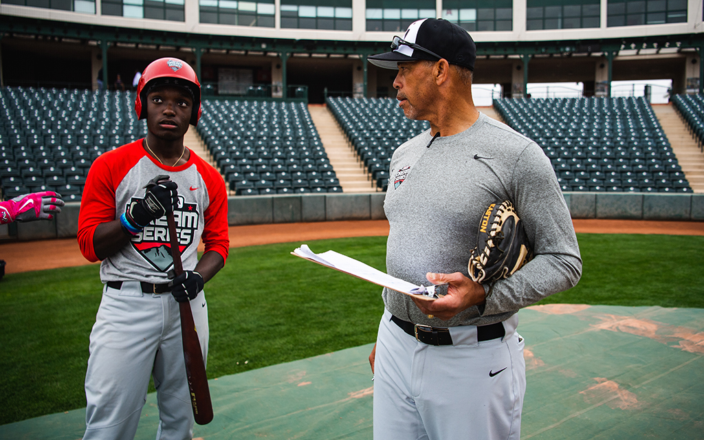 Darrell Miller, right, a former major leaguer and coach at the Dream Series, believes that he was pushed to play in the outfield over playing behind the plate because he was “tall and ran a 6.60.” (Photo by Kelsey Grant/MLB Photos via Getty Images)