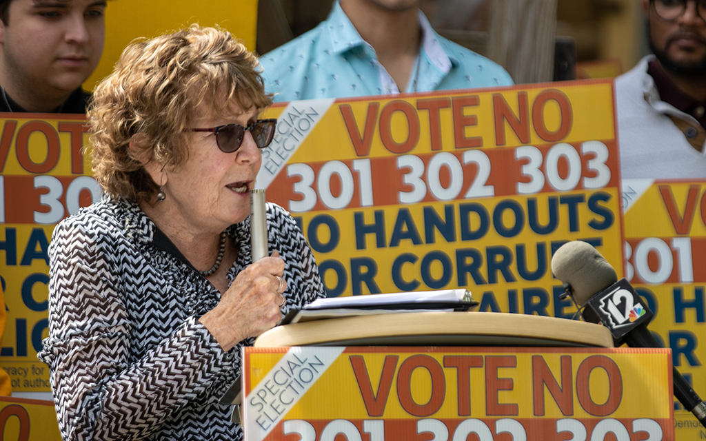 Gayle Shanks, co-owner of Changing Hands Bookstore in Tempe, speaks against special ballot propositions 301, 302 and 303 on March 20, 2023, in Tempe. The propositions will appear on a special election ballot in May in Tempe and, if passed, would make the Arizona Coyotes arena and entertainment district possible. (Photo by Drake Presto/Cronkite News)