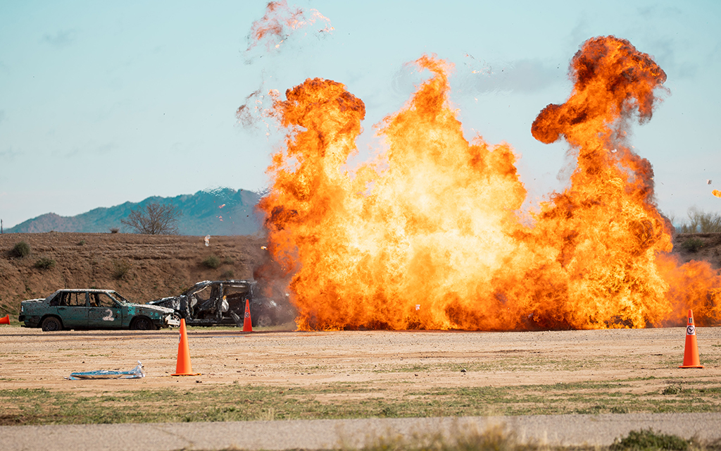 Raven’s Challenge subject matter expert David Bebout (not pictured) demonstrates a type of explosion commonly used in Hollywood films at Pinal County Airpark on March 2, 2023. Three pounds of explosive make up the charge. (Photo by Jack Wu/Cronkite News)