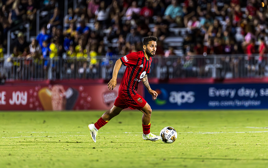 Phoenix Rising player Jose Hernandez with the ball.