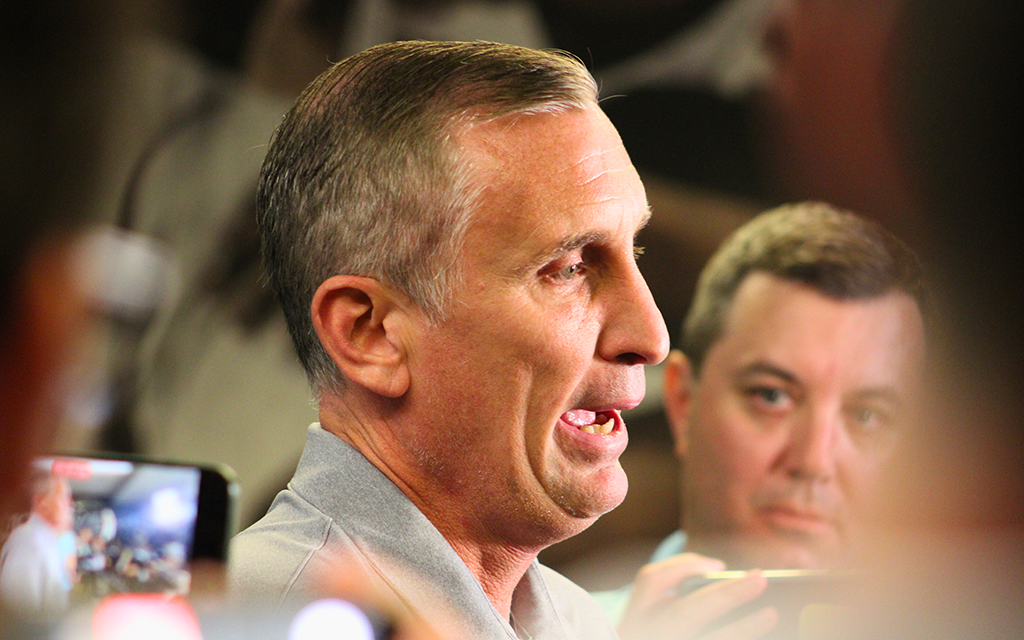 Bobby Hurley talking to the media.