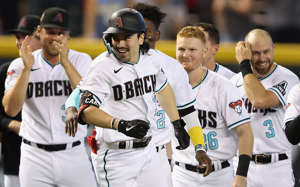 Rookie Corbin Carroll celebrating with teammates