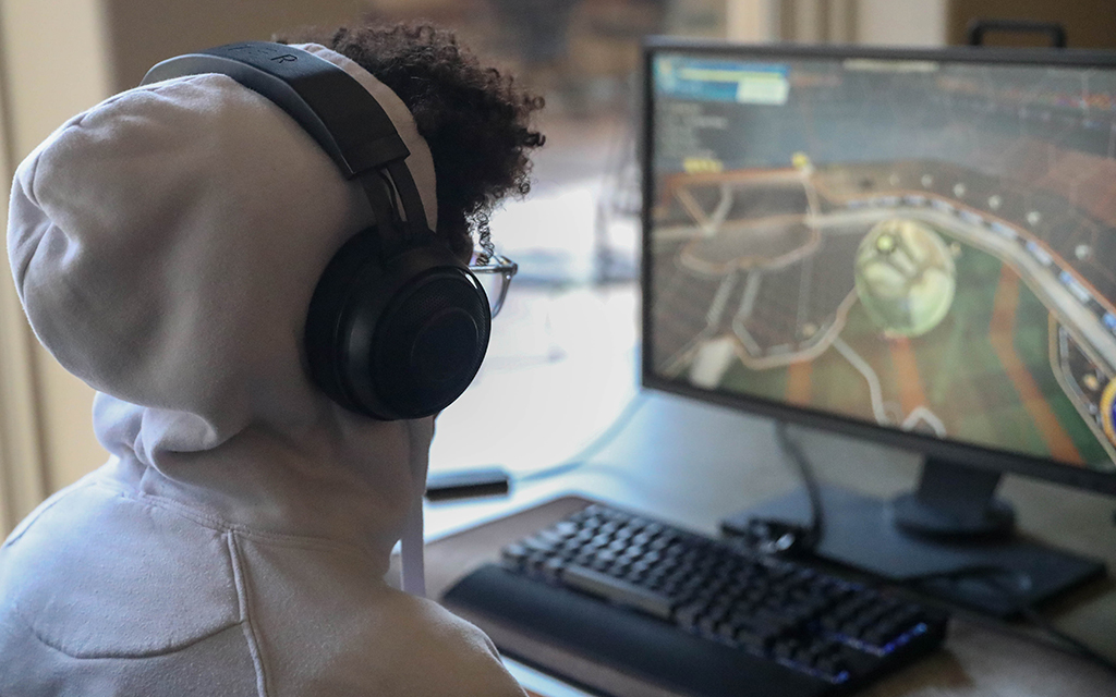Students from various high schools across Arizona prepare their gaming setups as they anticipate the start of the fifth season of esports competition. (Photo by Daniella Trujillo/Cronkite News)