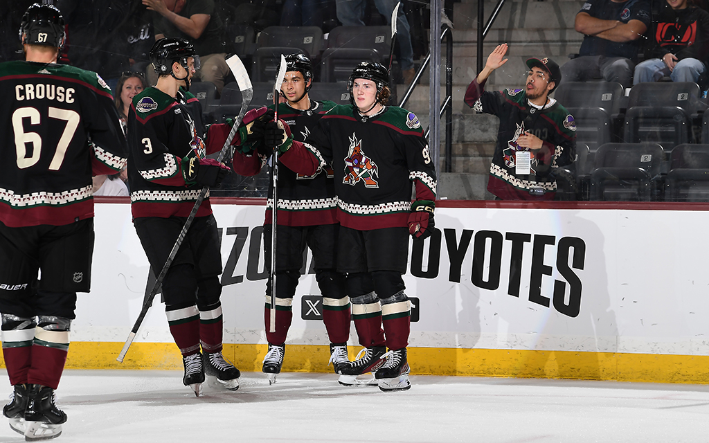 Arizona Coyotes young guns Dylan Guenther, No. 92, and Logan Cooley, No. 3, seen here in a game against the New Jersey Devils, represent the team's shift toward a youthful future. (Photo by Norm Hall/NHLI via Getty Images)