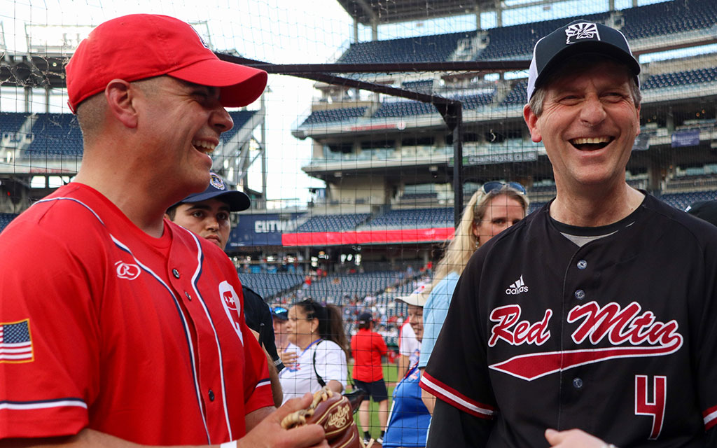 Reps. Juan Ciscomani, left, and Greg Stanton discuss the purpose of the Congressional Baseball Game at Nationals Park in Washington, D.C., on June 12, 2024. (Photo by Morgan Kubasko/Cronkite News)