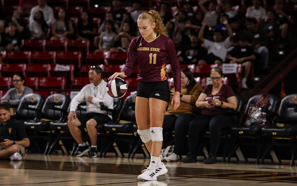 Mary Shroll bounces volleyball before serving at the Webb-Burbridge Classic