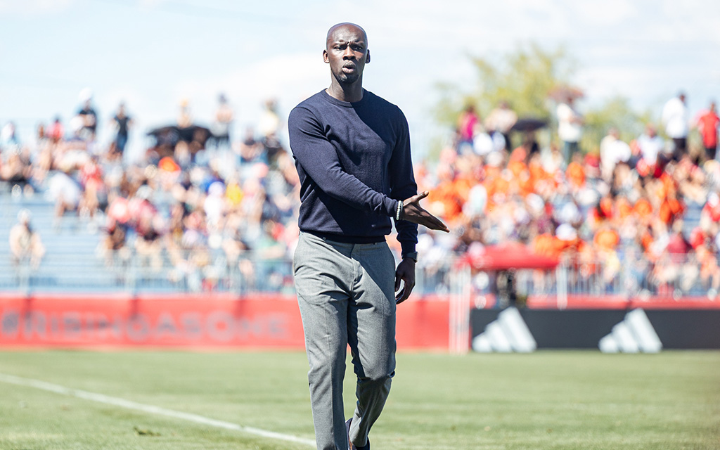 Phoenix Rising coach Pa-MoDou Kah gestures on the sideline.